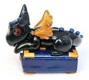 baby-black-and-gold-perky-bookwyrm